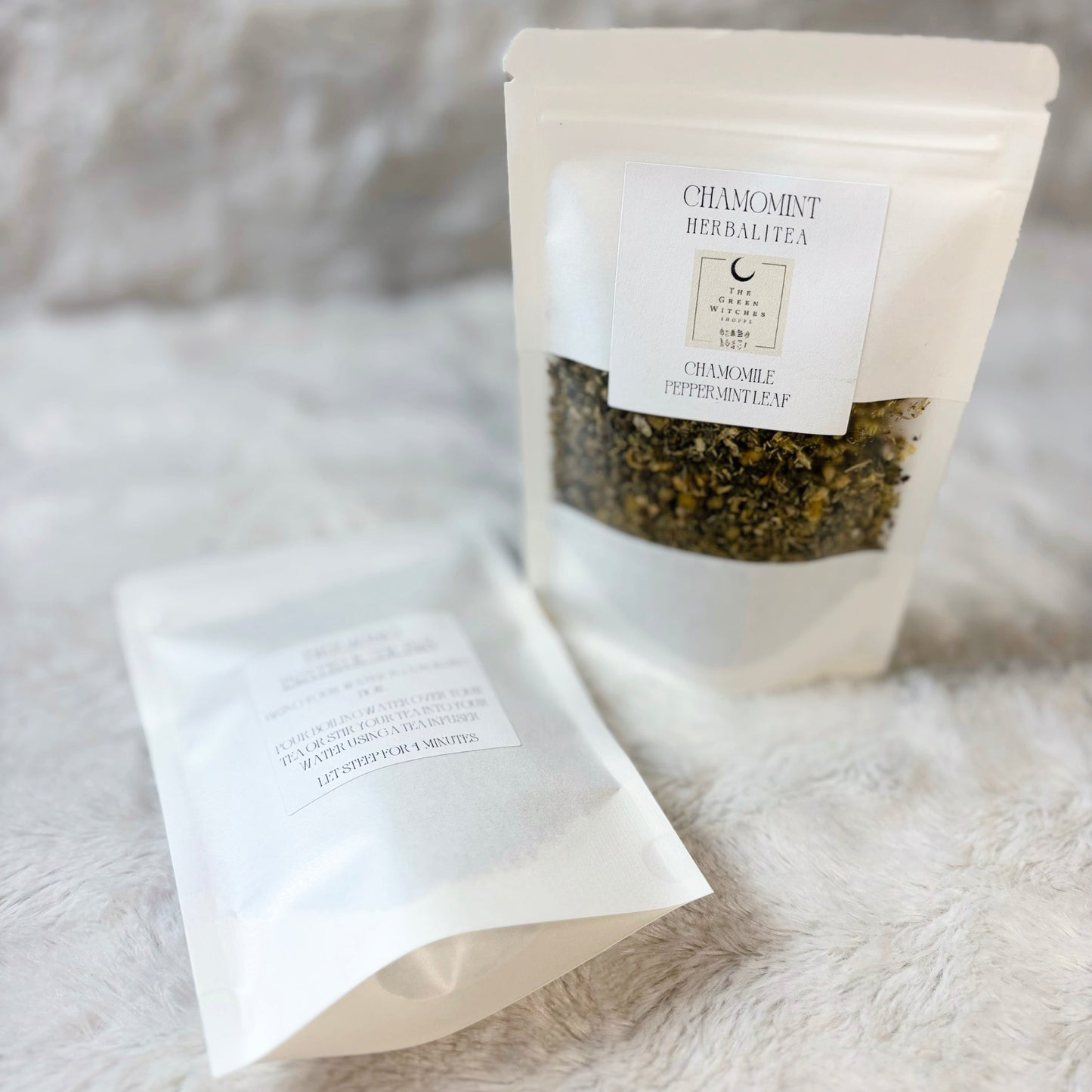 Tea package with a white label on a textured surface