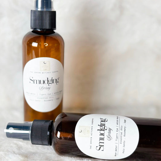 Two Smudge & Co. diffusers on a textured white surface