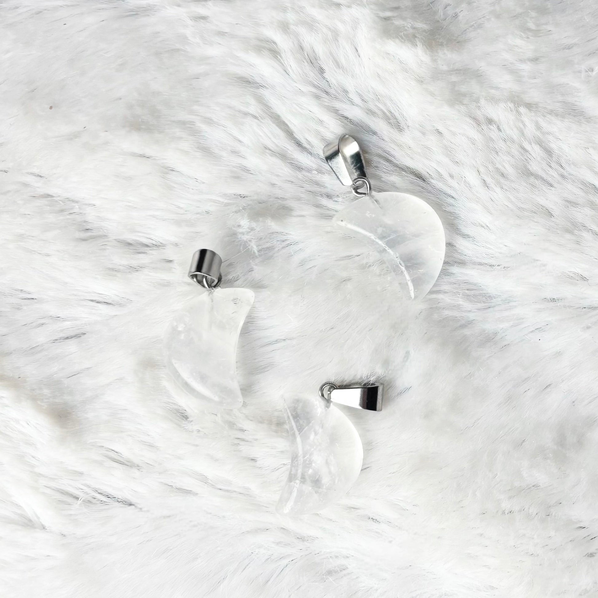 Clear glass ornament on a white fur surface
