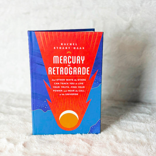 Book "Mercury in Retrograde" on a white background