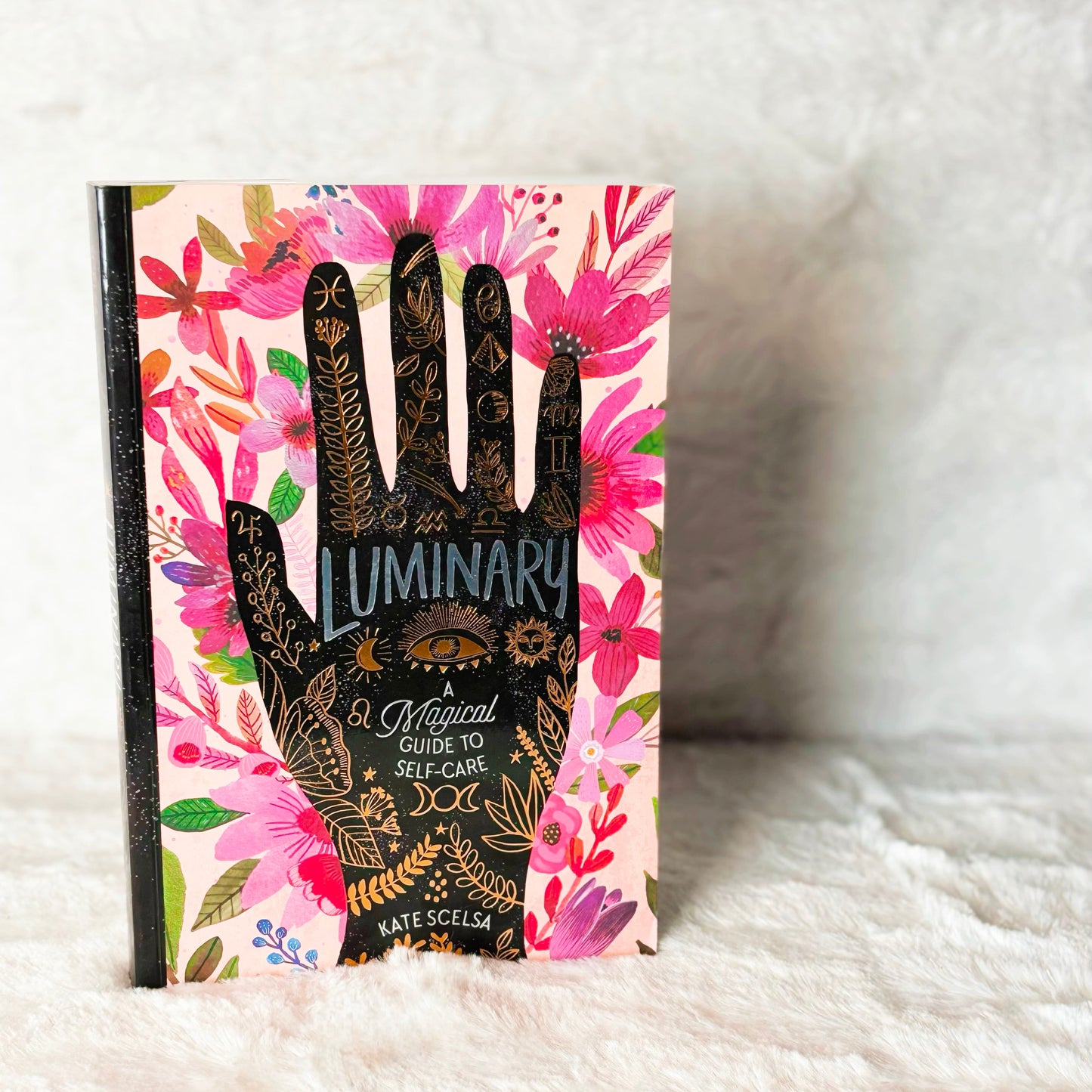 Book "Luminary" on a white background