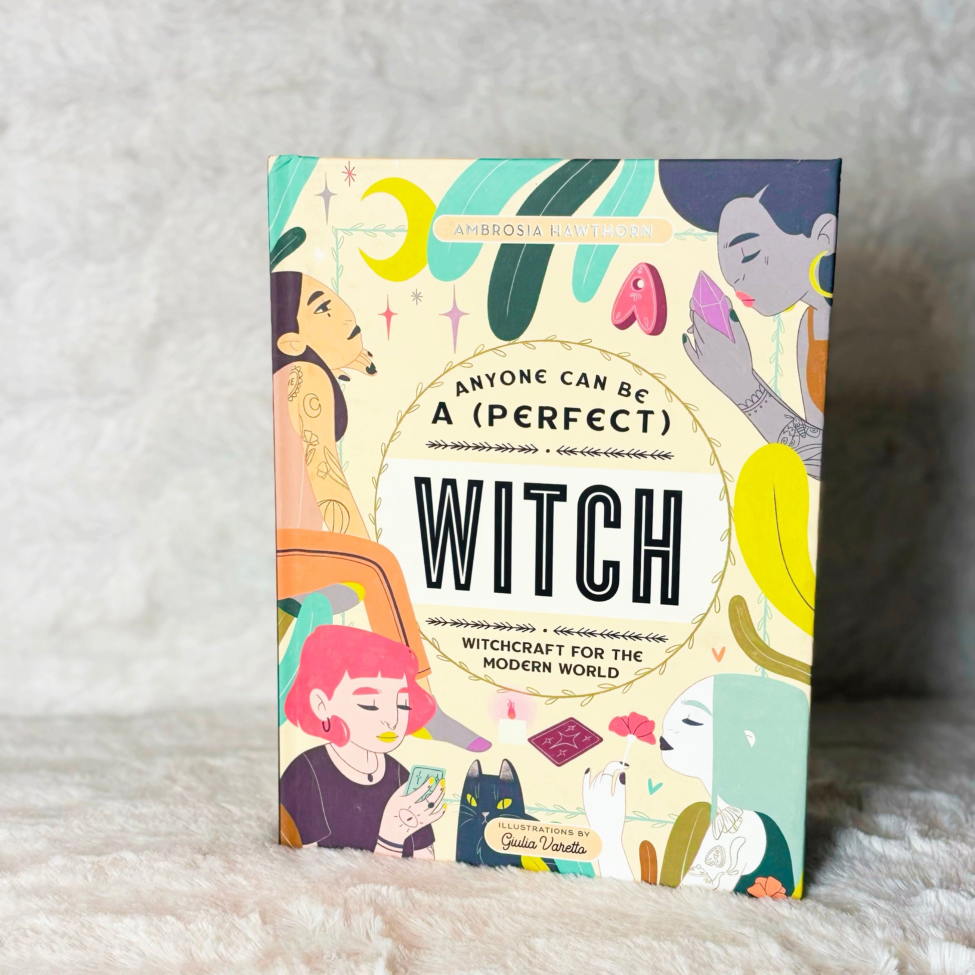 Book "Anyone Can Be a (Perfect) Witch" on a white background
