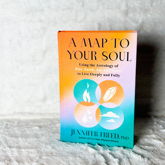 Book titled 'A Map to Your Soul' by Jennifer Freid on a textured surface