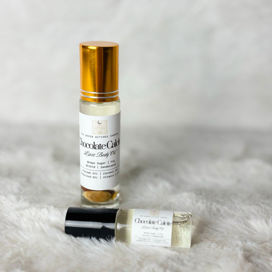 Small bottle and square container of 'Chocolate Caviar' on a white fur background