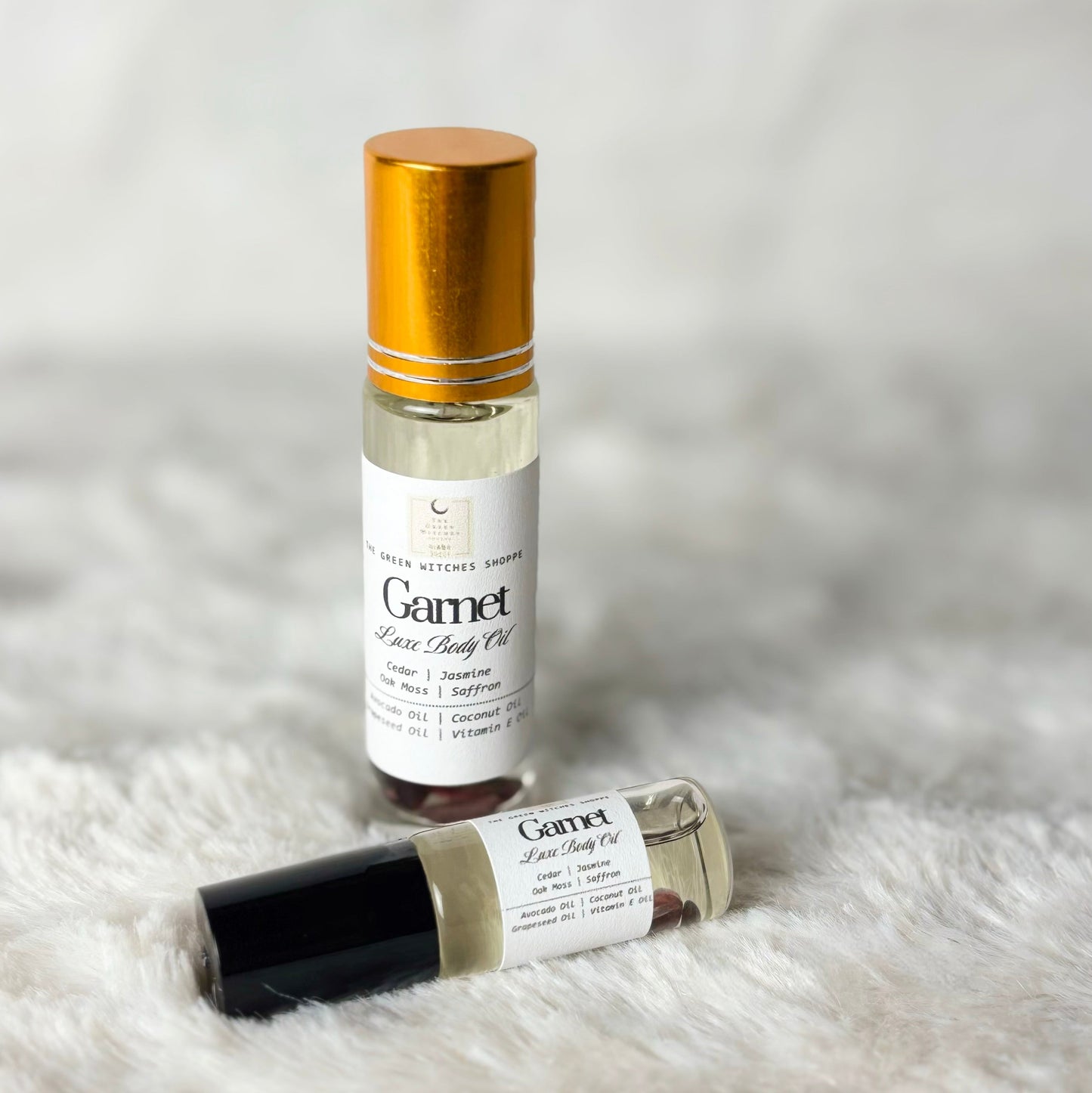 Bottles of body oil on a white background