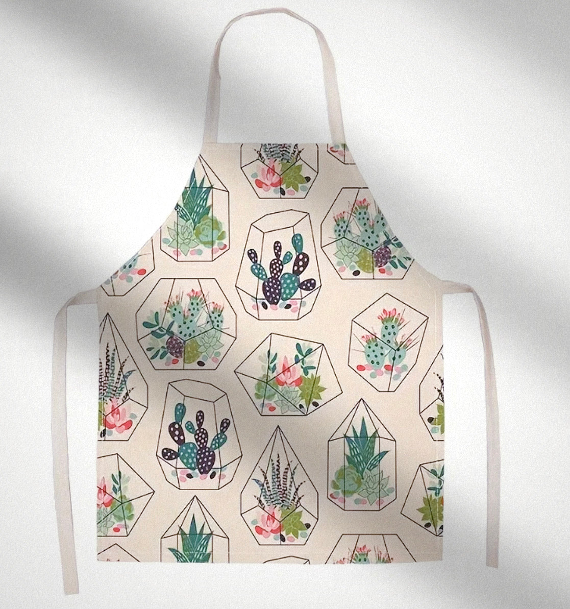 Apron-Geometric Cacti